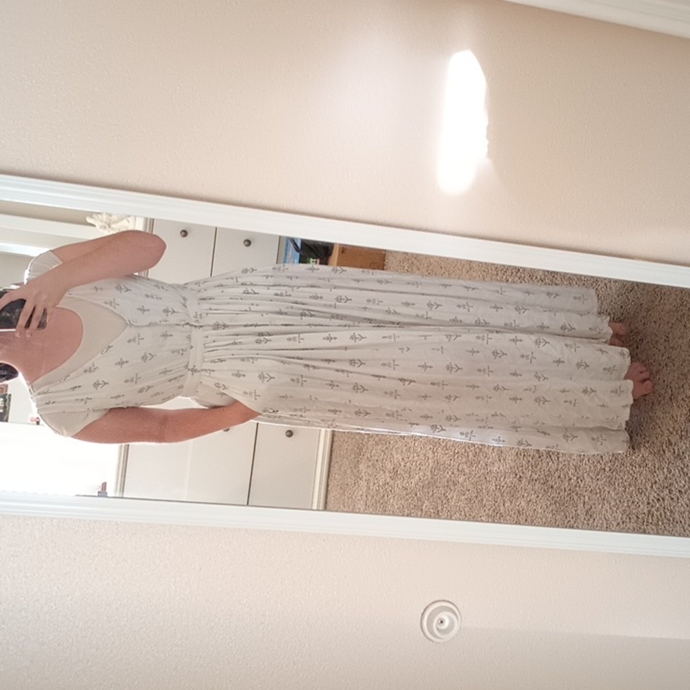 White, low neck dress
